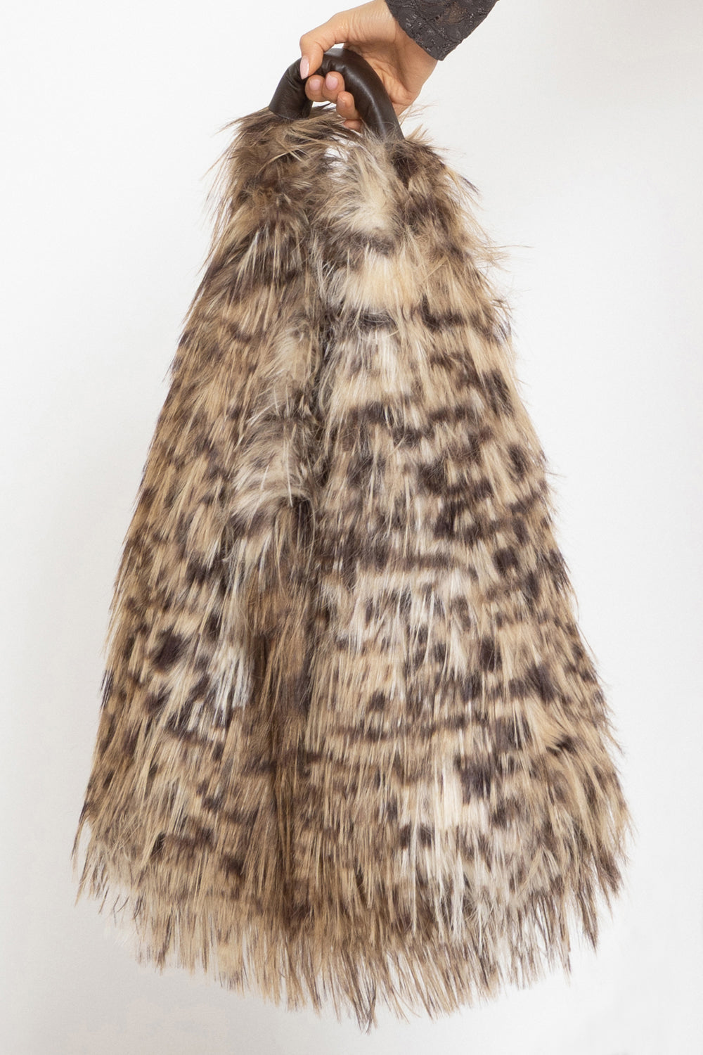 REVERSIBLE SERVAL FAUX FUR AND LEATHER BAG - ESSENTIALS