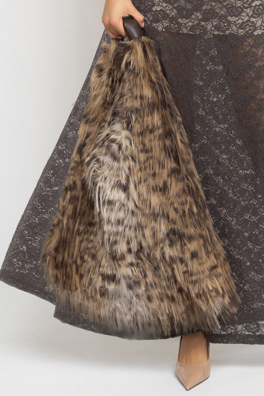 REVERSIBLE SERVAL FAUX FUR AND LEATHER BAG - ESSENTIALS