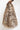 REVERSIBLE SERVAL FAUX FUR AND  LEATHER BAG - ESSENTIALS