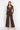 BROWN VISCOSE STRETCH BODYSUIT WITH DEEP V-NECK AND SUEDE TIE DETAIL - ESSENTIALS JIORO КАФЯВО БОДИ ОТ ВИСКОЗА С ДЪЛБОКО V-ОБРАЗНО ДЕКОЛТЕ И ВЕЛУРЕНИ ВРЪЗКИ - ESSENTIALS JIORO